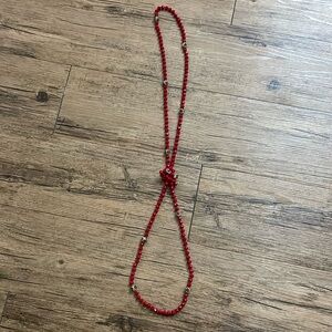 Red bead necklace with cheetah print beads